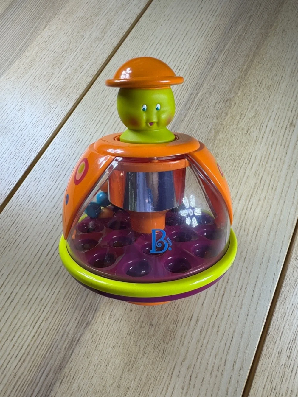 Orange Spinning Popper‎ - Bright Orange Learning Toy